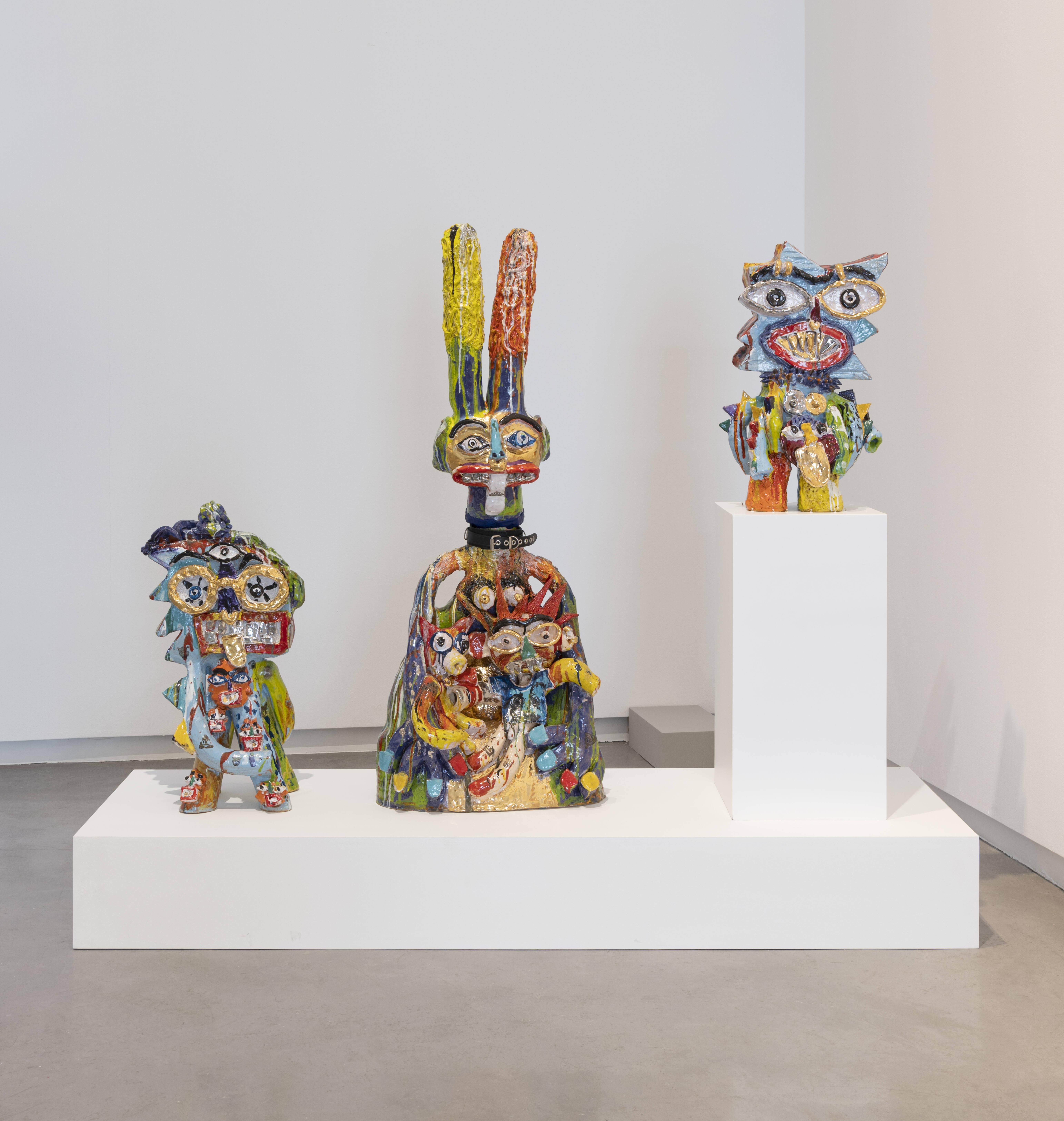 Ramesh Nithiyendran, Fertility Figure III 2022 Earthenware and leather collar 140 × 53 × 35 cm, Figure with Spiky Head 2022 Earthenware 64 × 41 × 25 cm, Figure with Spiky Head II 2022 Earthenware 73 × 37 × 29 cm, Courtesy of the artist and Jhaveri Contemporary, Mumbai