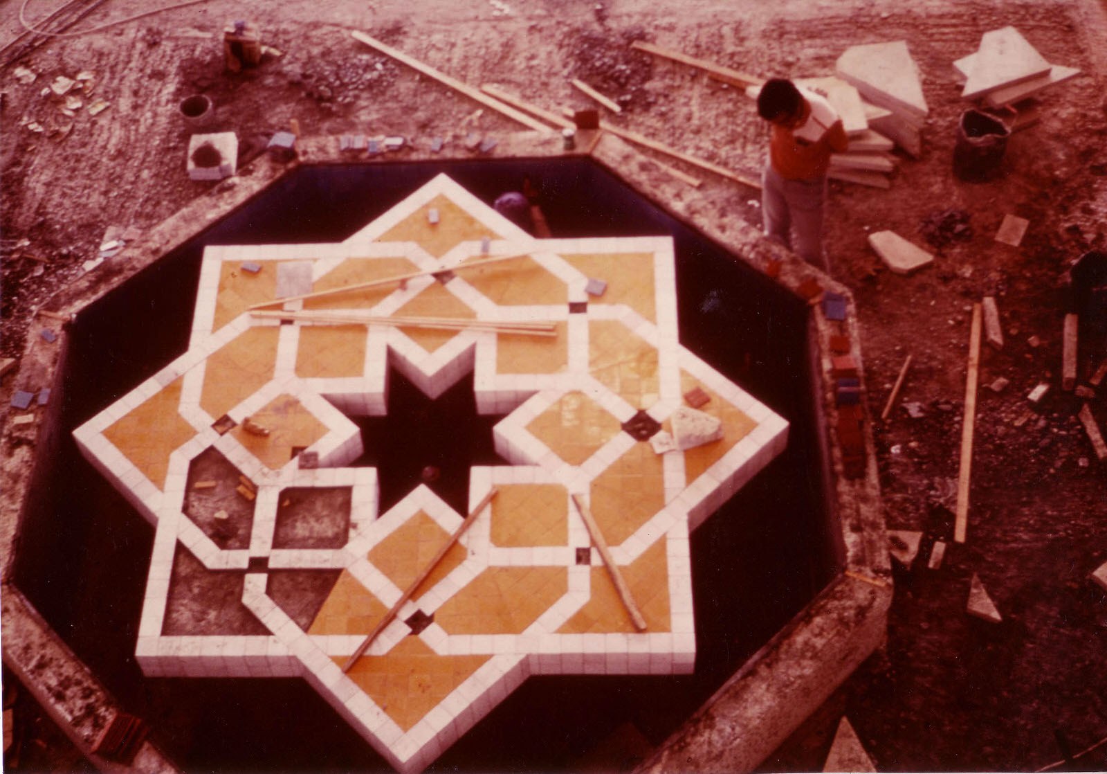 Fountain under construction with tiling, courtesy of Hisham Ashkouri